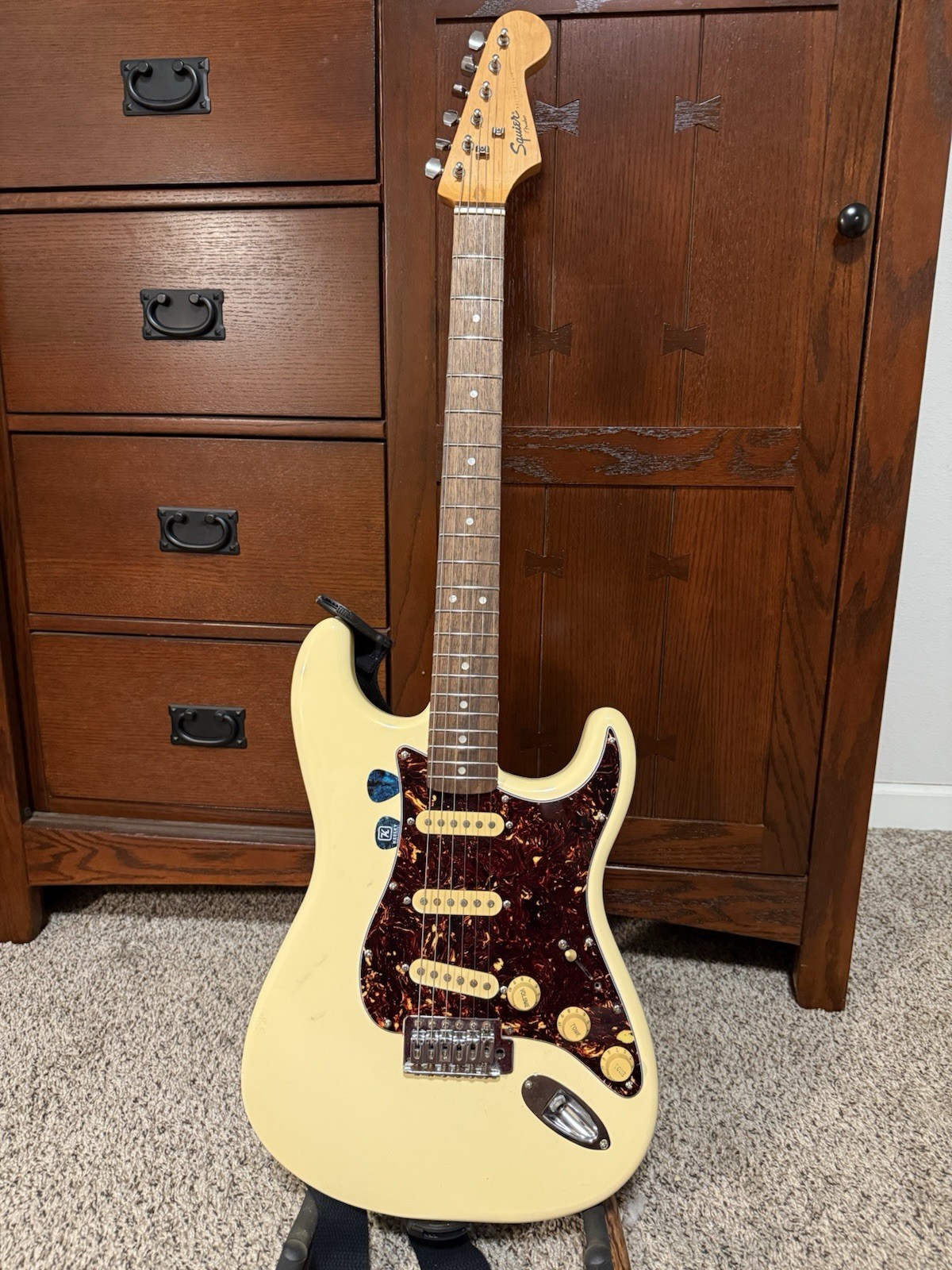Squire Strat by Fender. Honey Cream With Tortoise Shell Electric Guitar
