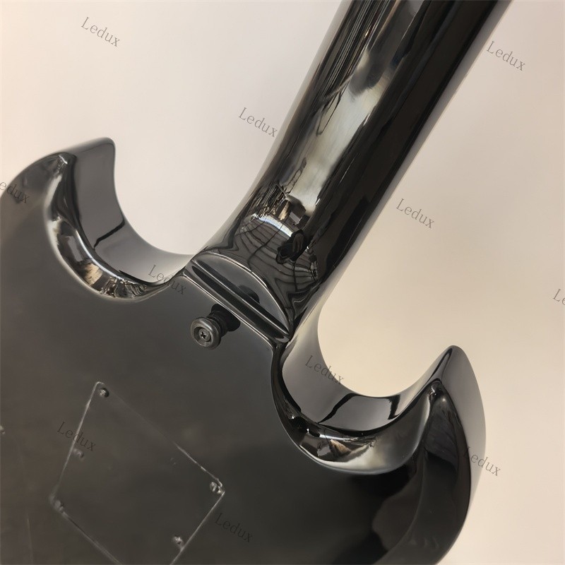 electric guitar black tremolo bridge HHH pickups rosewood fretboard lock nut
