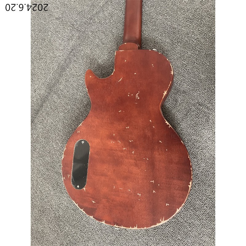 Electric guitar thin brown burst and see wood grain brown back black cover wrap