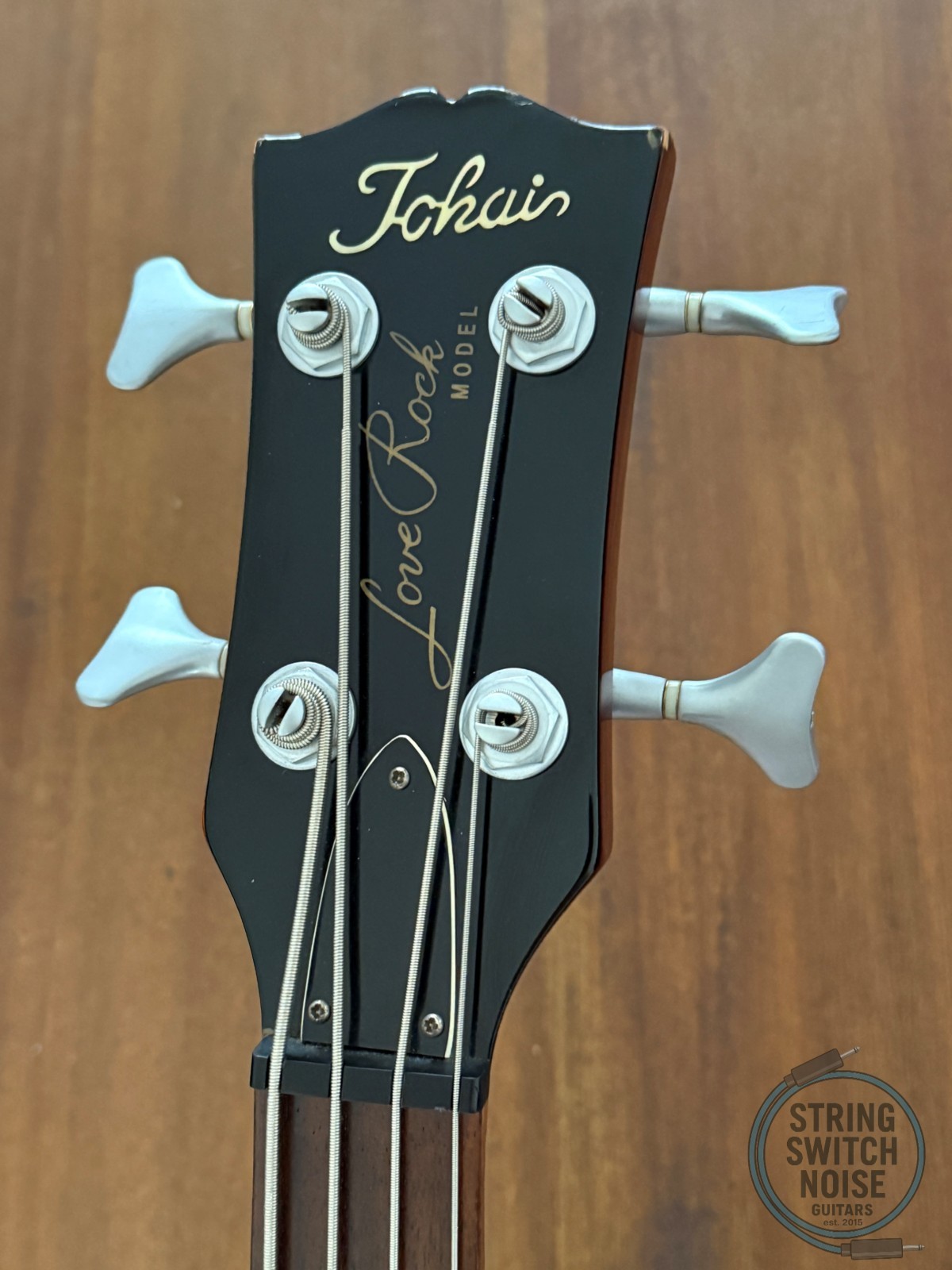 Tokai Les Paul Bass, Flamed Honey Burst, 1990s