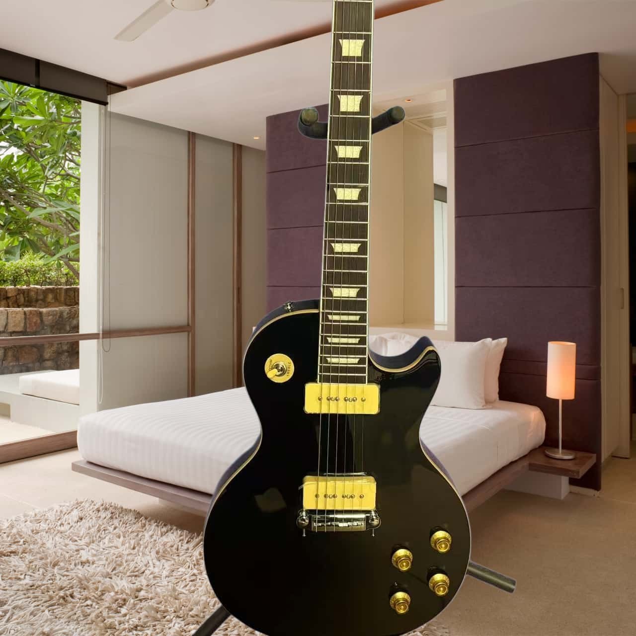 All-black body with trapezoidal inlays, rosewood fingerboard, mahogany body, P90