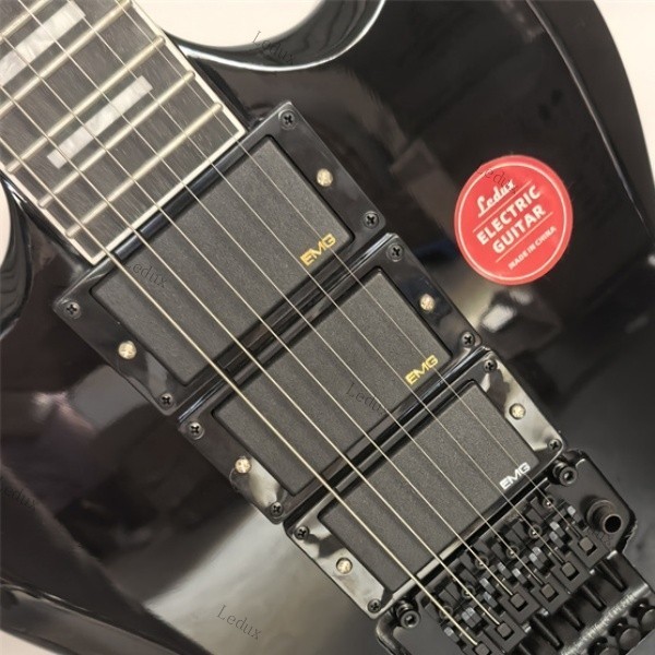 electric guitar black tremolo bridge HHH pickups rosewood fretboard lock nut