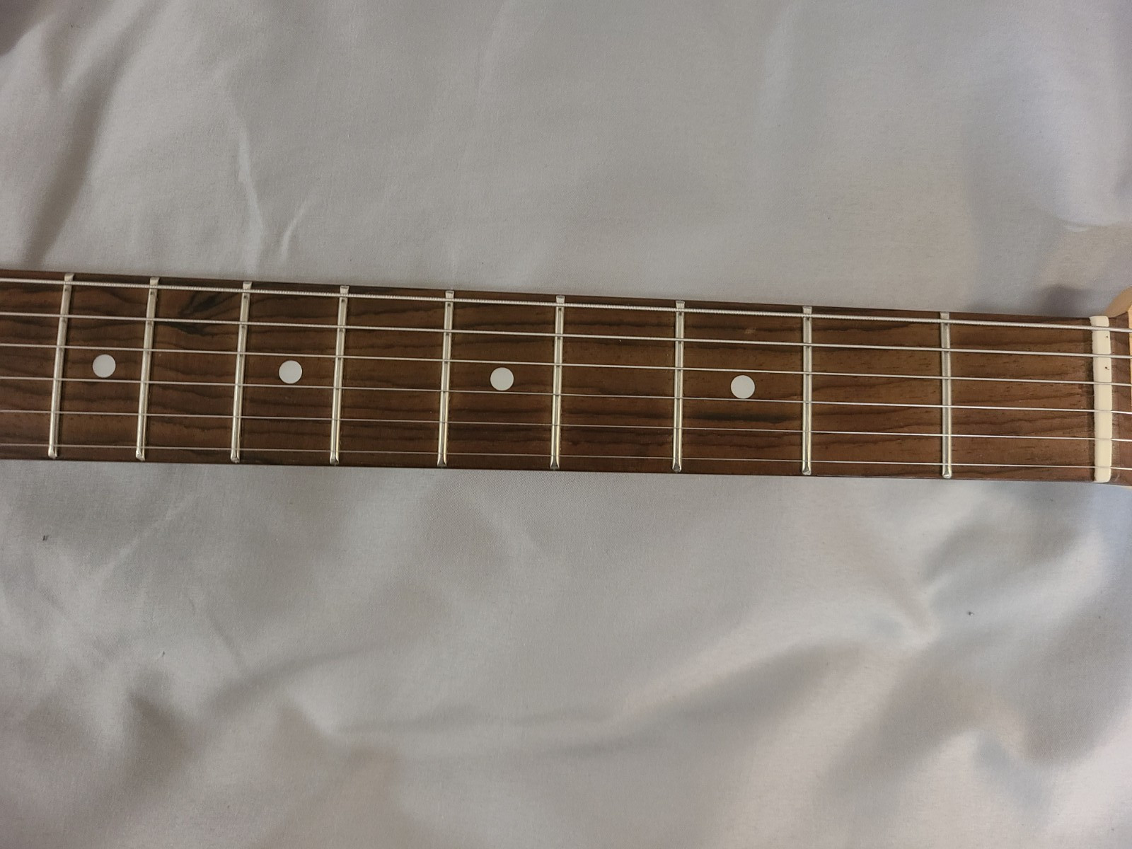 Stratocaster Partscaster – transparent blue with white binding