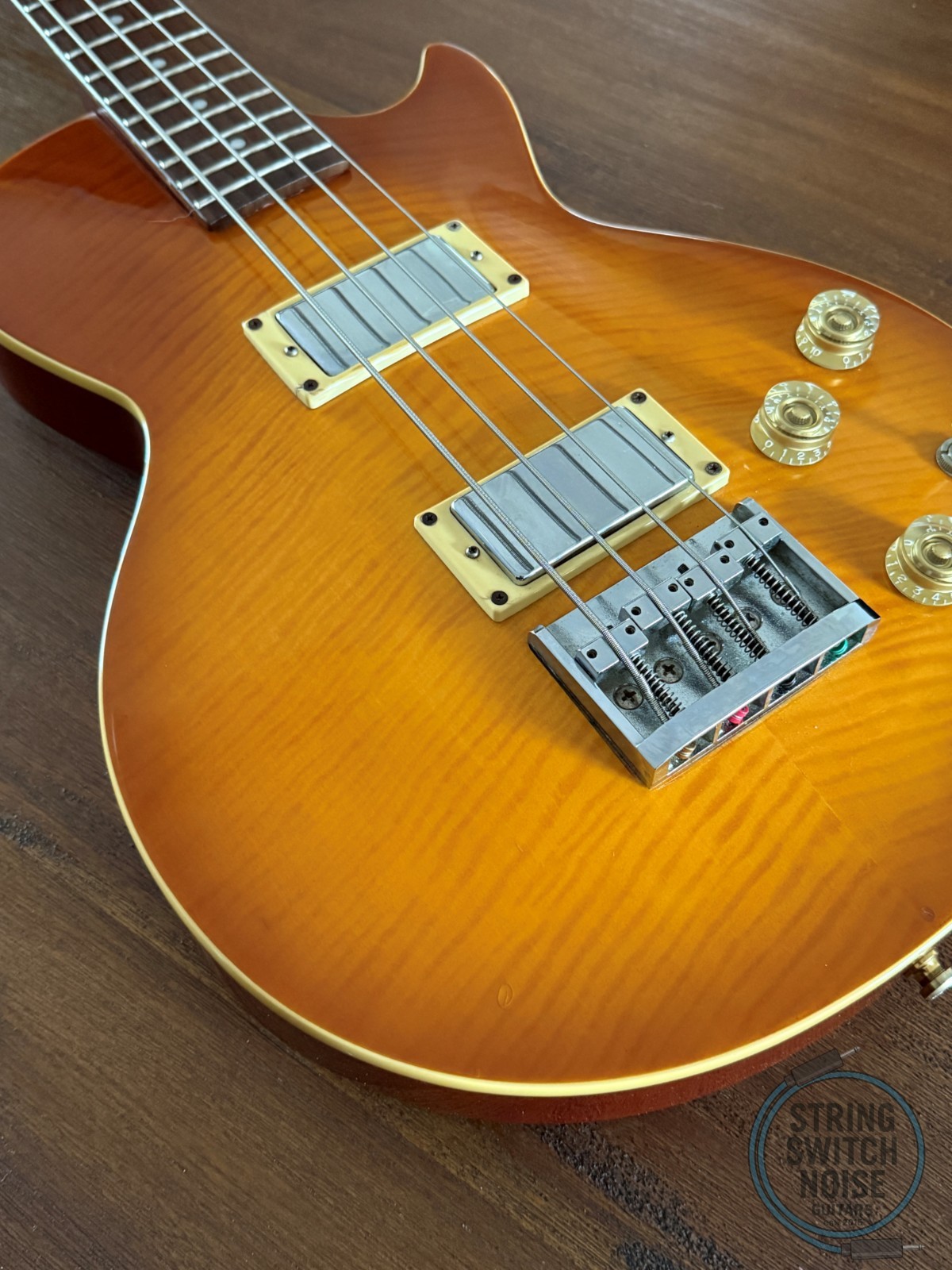 Tokai Les Paul Bass, Flamed Honey Burst, 1990s