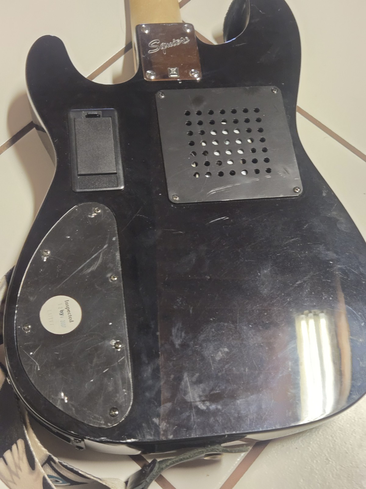 Black Fender Squire Mini With A Perri’s Skull Strap 2007