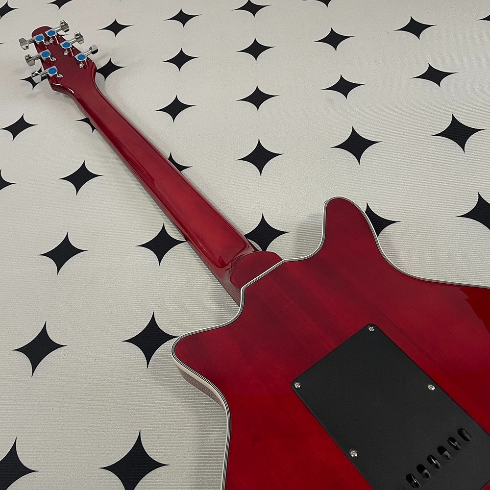 High-quality electric guitar; mahogany body and neck; stainless steel frets