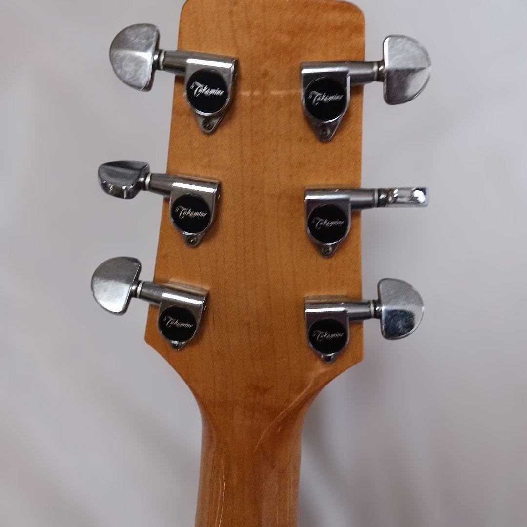 Takamine EF 350 MHC export model. Comes with electric acoustic case.