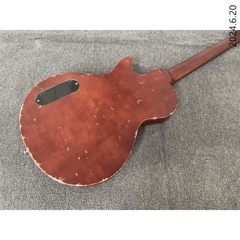 Electric guitar thin brown burst and see wood grain brown back black cover wrap