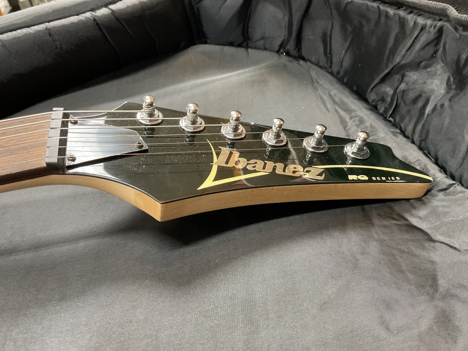 Ibanez RG120 black electric guitar w/ road runner gig bag