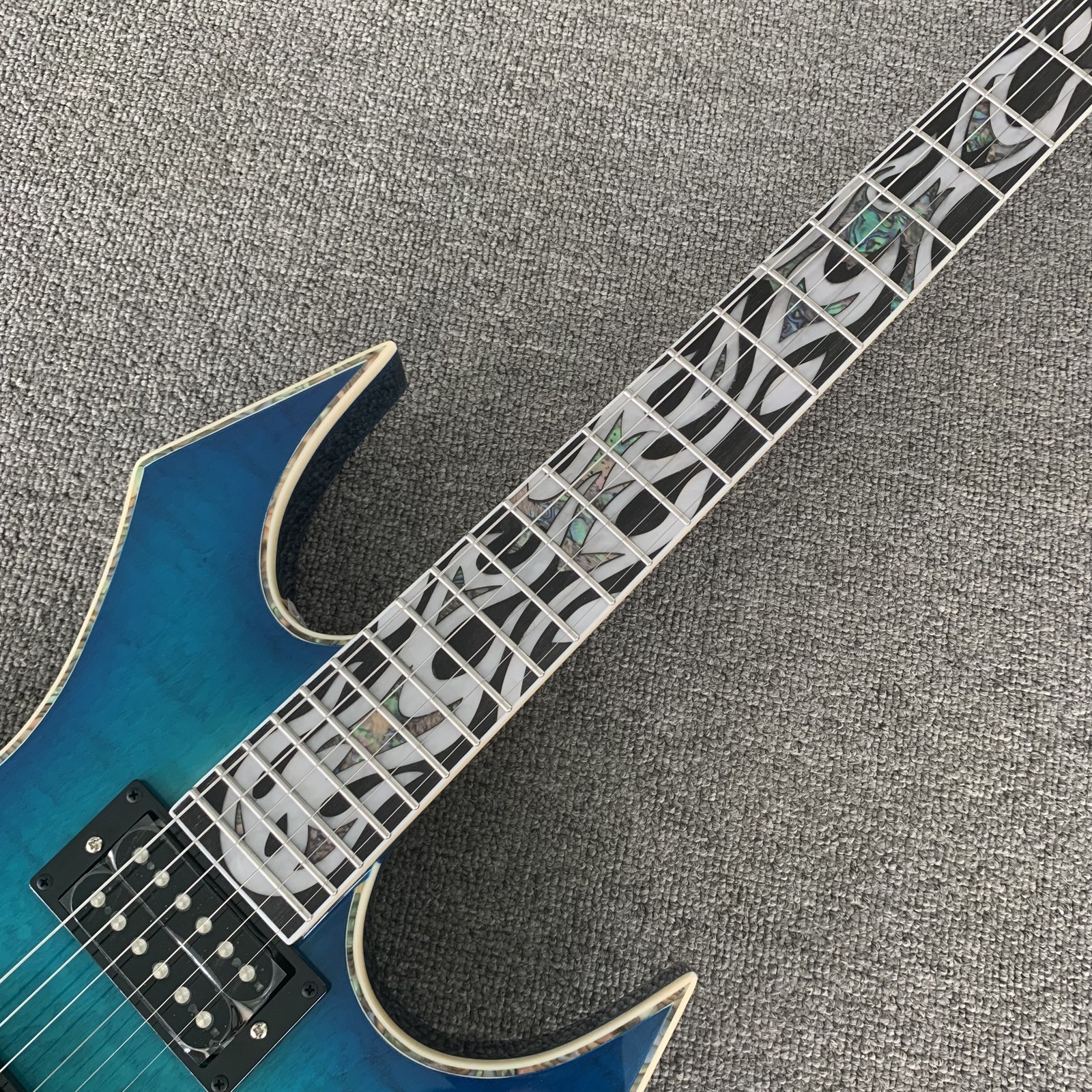 Blue Flamed top unique Shape Solid body Electric Guitar HH pickup black part