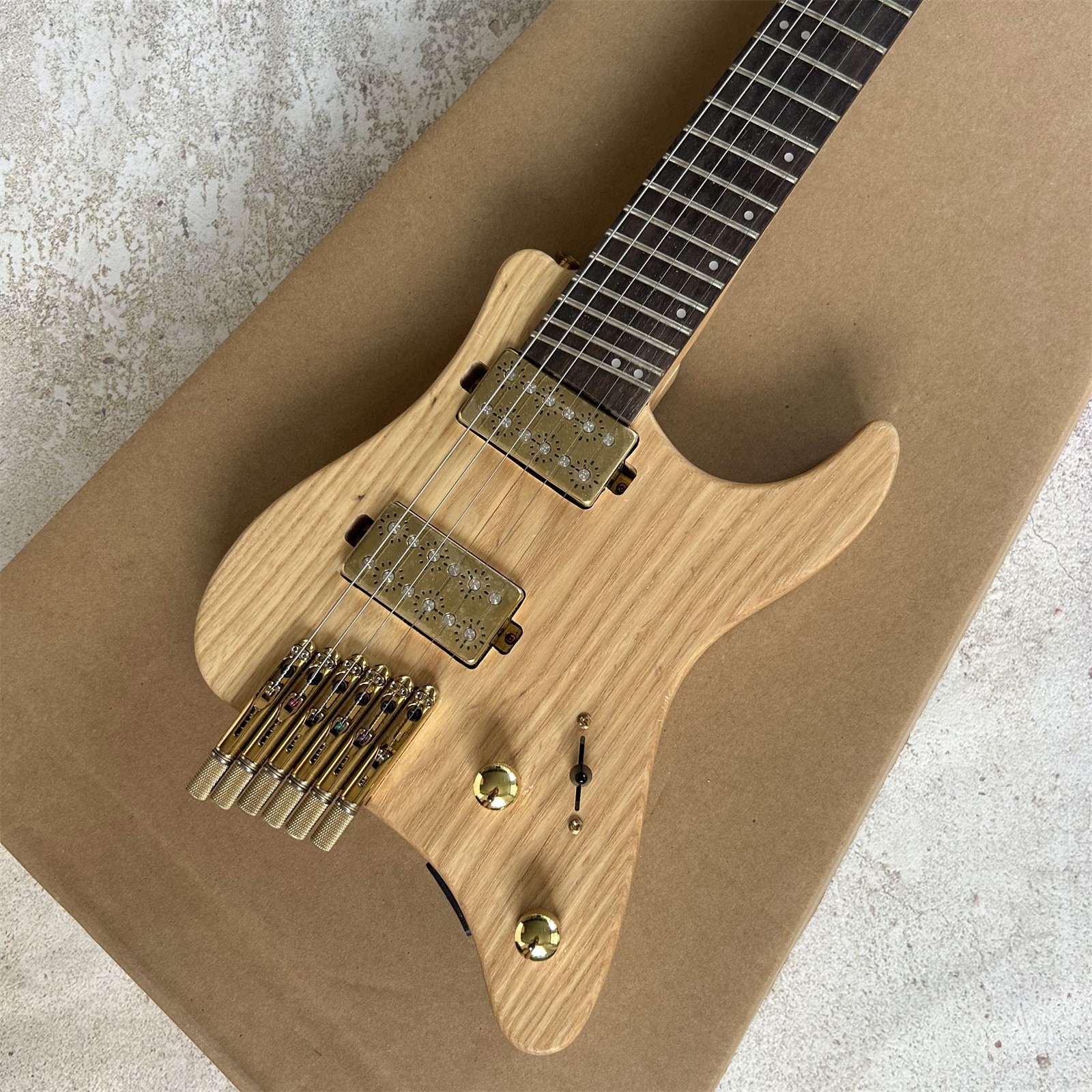 Portable Headless High End Solid Body Log Color Electric Guitar 24 Frets