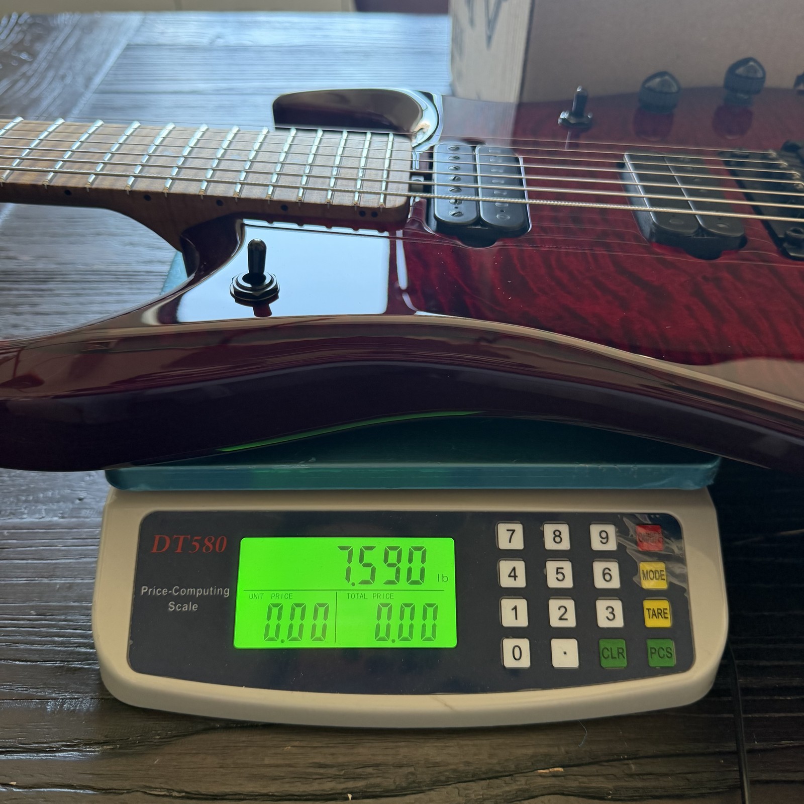 Ernie Ball Music Man JP15 7-String Electric Guitar – Red Tide Quilt
