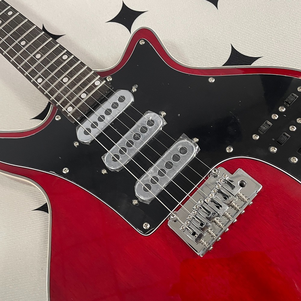High-quality electric guitar; mahogany body and neck; stainless steel frets