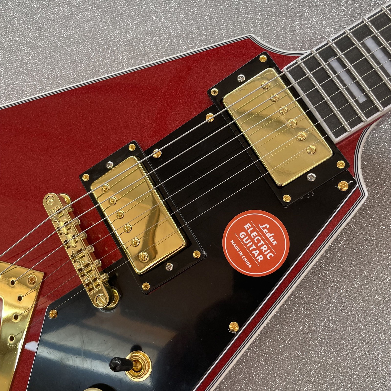 Unique metallic red V Electric Guitar Mahogany Body with pickguard free ship