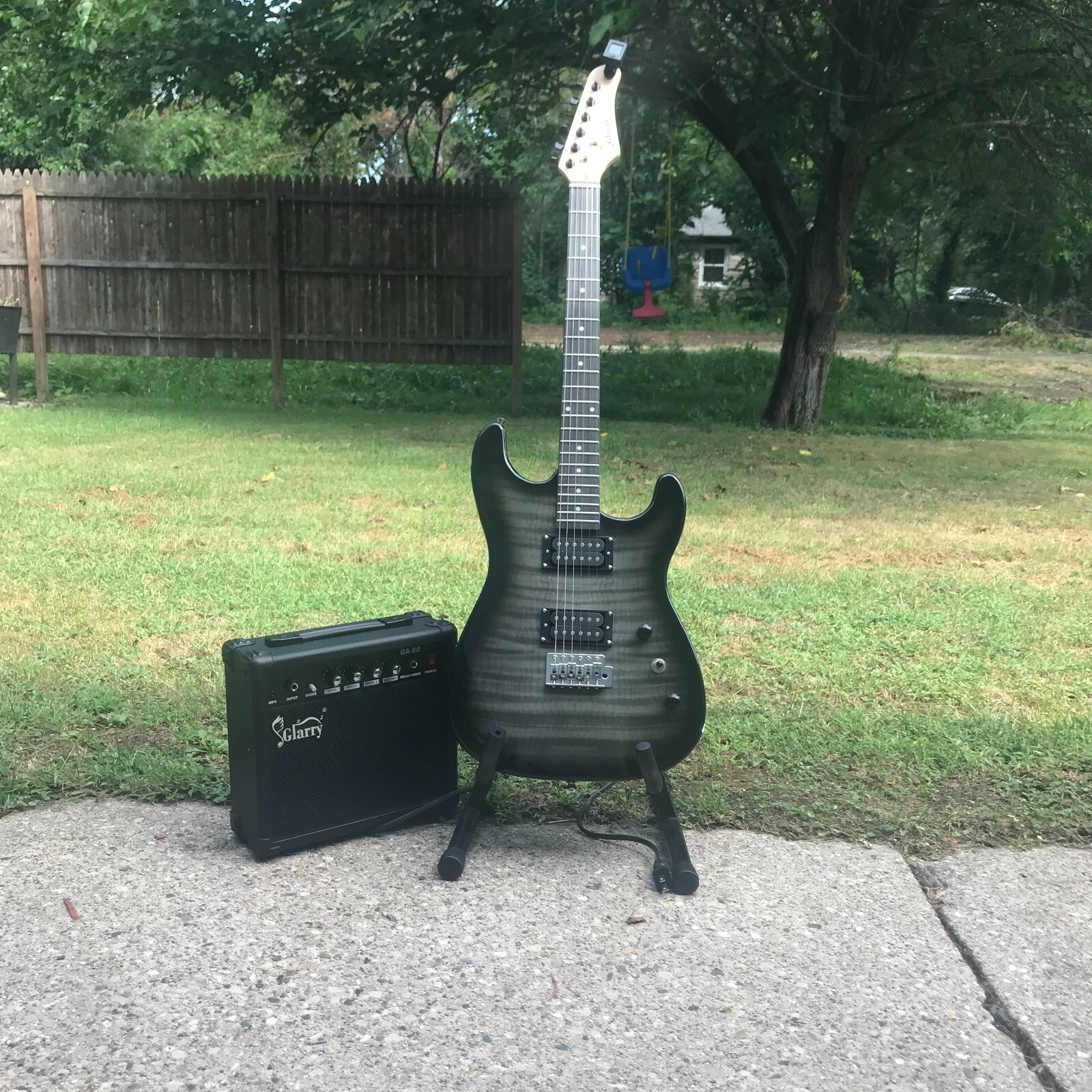 Black Electric Guitar Starter Package with Flamed Veneer Top 20-Watt Amp & More