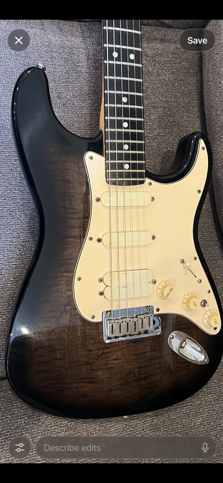 1990 Fender Strat Ultra transparent black over a figured flamed maple top