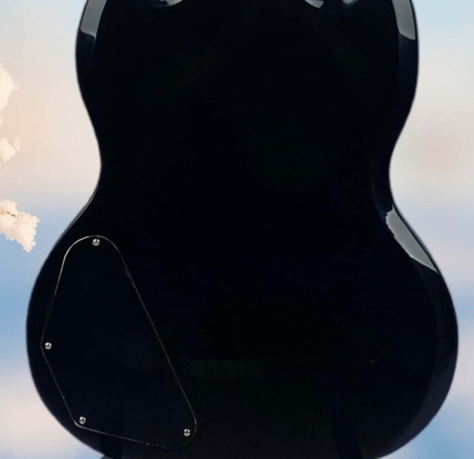 Black electric guitar with black protective cover and cross-shaped inlay.
