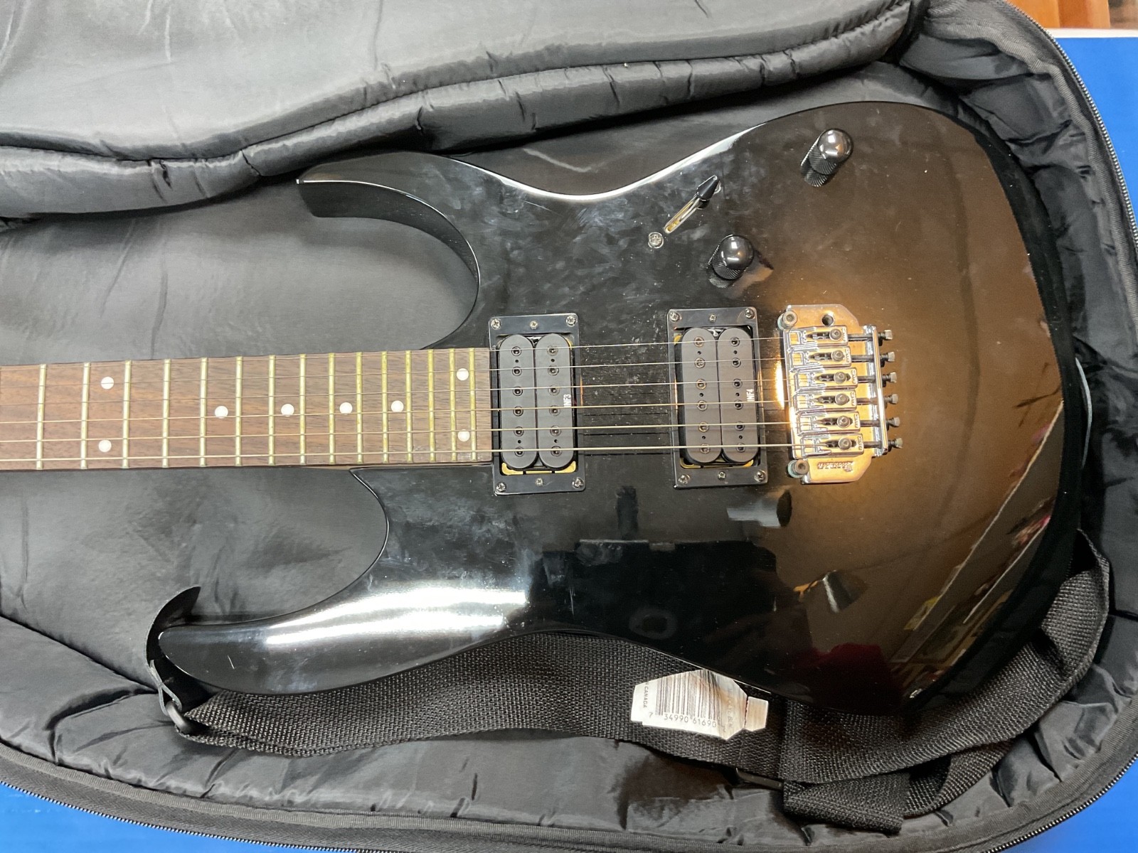 Ibanez RG120 black electric guitar w/ road runner gig bag