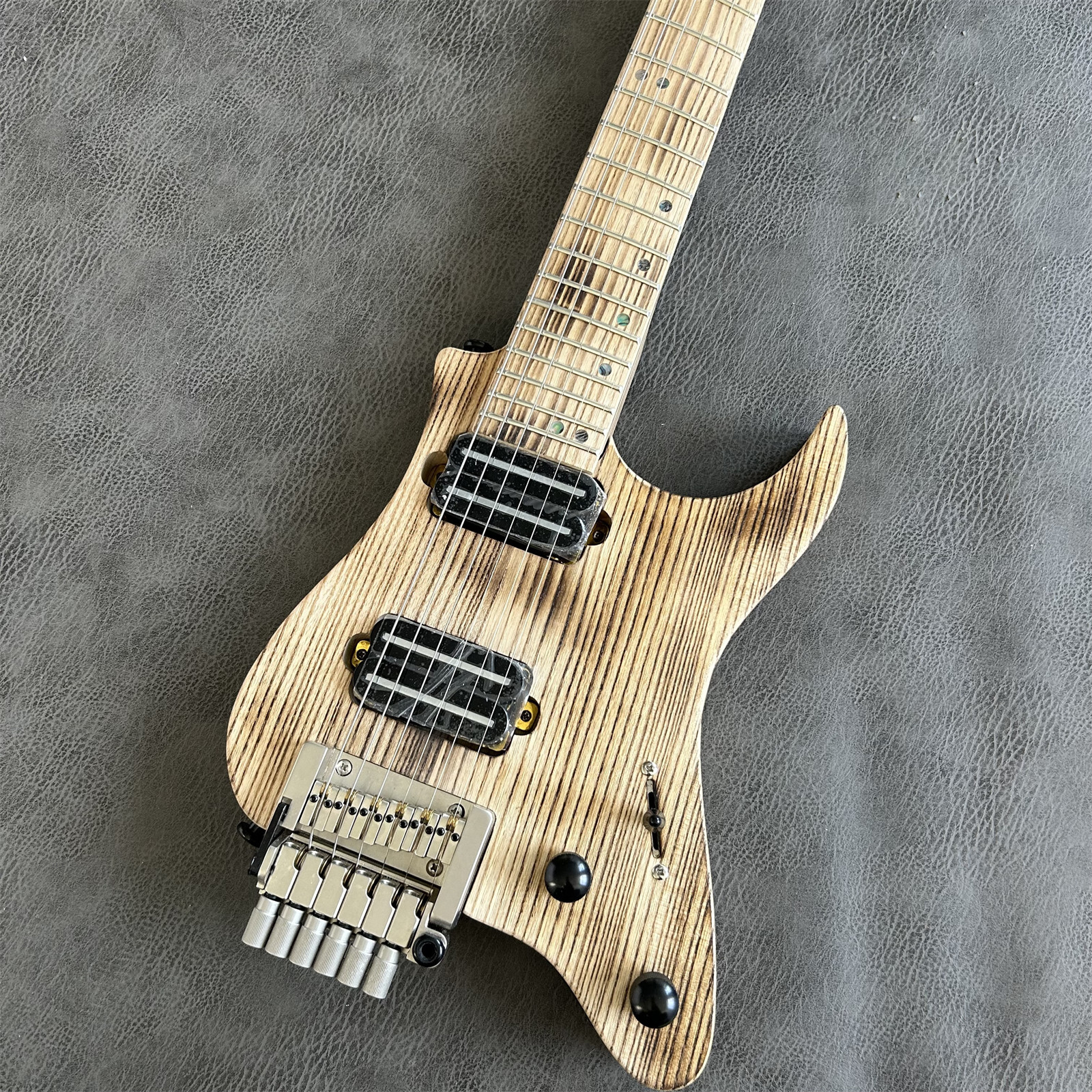 Portable Headless Smoke Bake High End Solid Body Electric Guitar 24 Frets