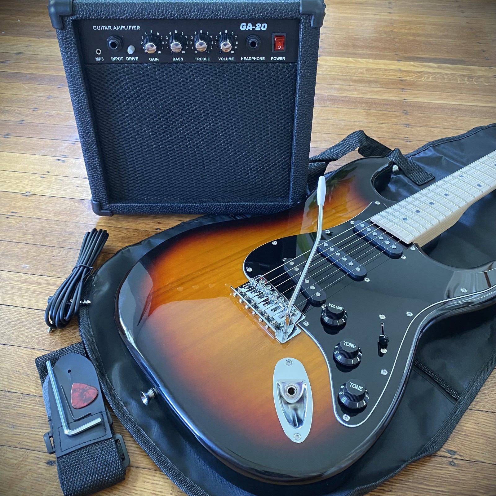 Full-Size Sunburst Electric Guitar Starter Package with 20-watt Amp, and More