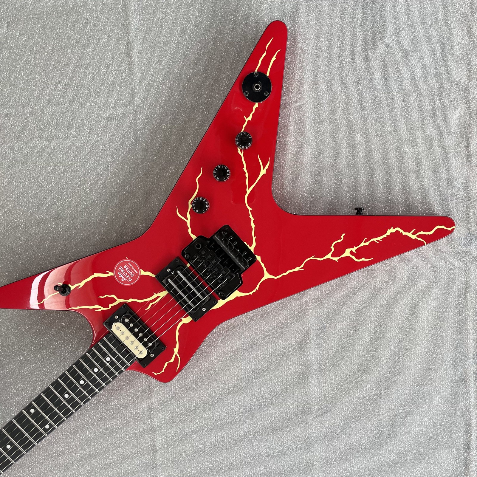 Unique V Electric Guitar H-H Pickups Tremolo Red Finish Black HW Lightning Print