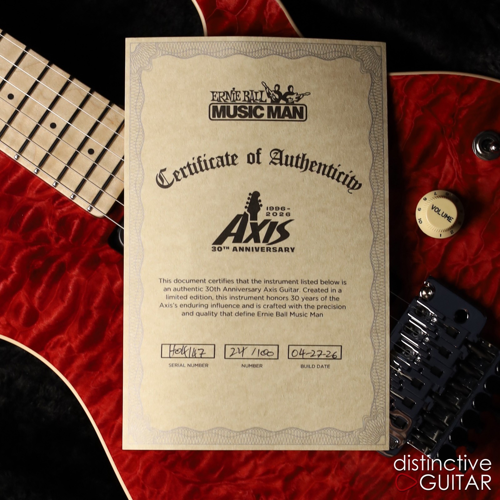 ERNIE BALL MUSIC MAN AXIS 30TH ANNIVERSARY – TRANSLUCENT RED QUILT