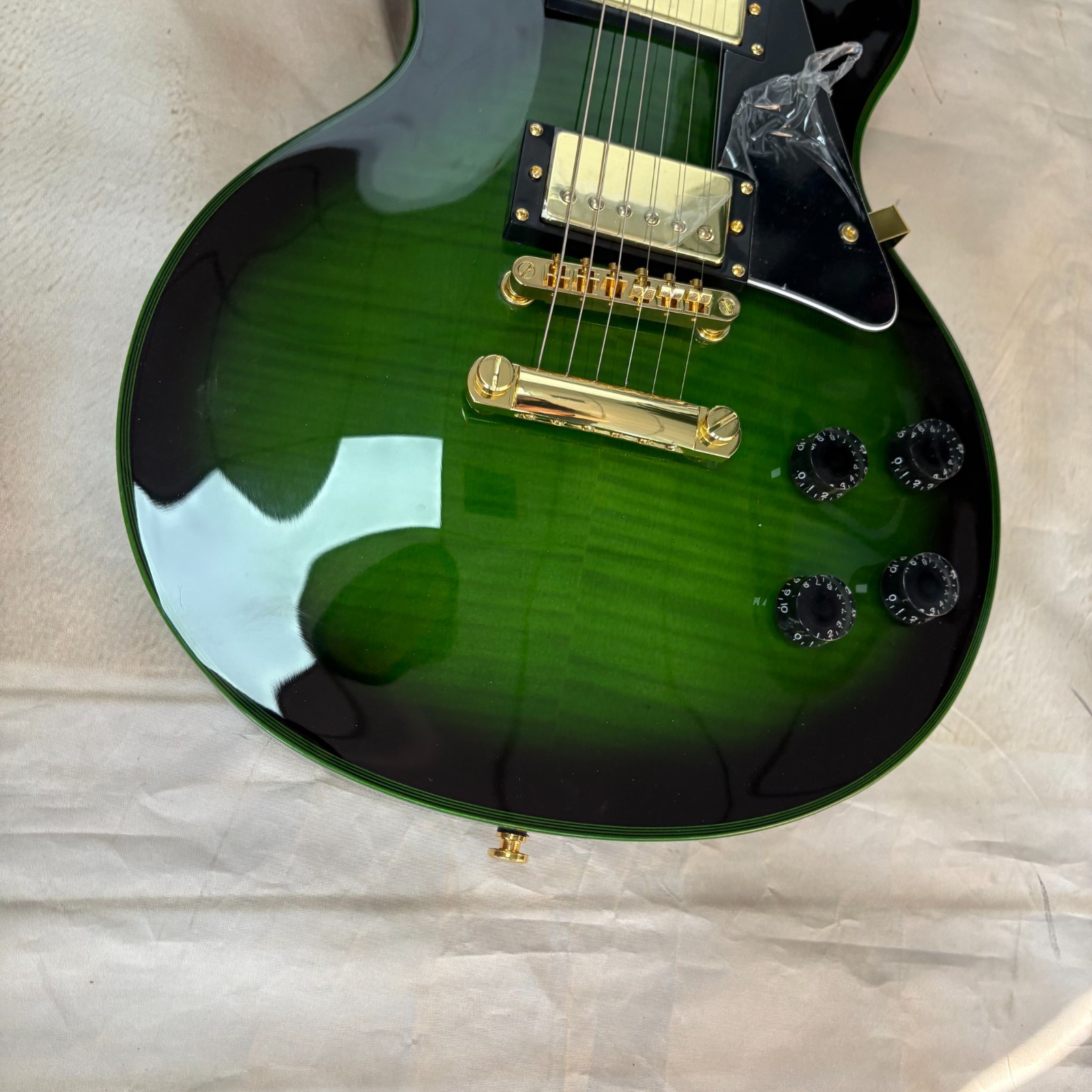 Metallic Green LP Style Electric Guitar Rosewood Fretboard Gold Hardware