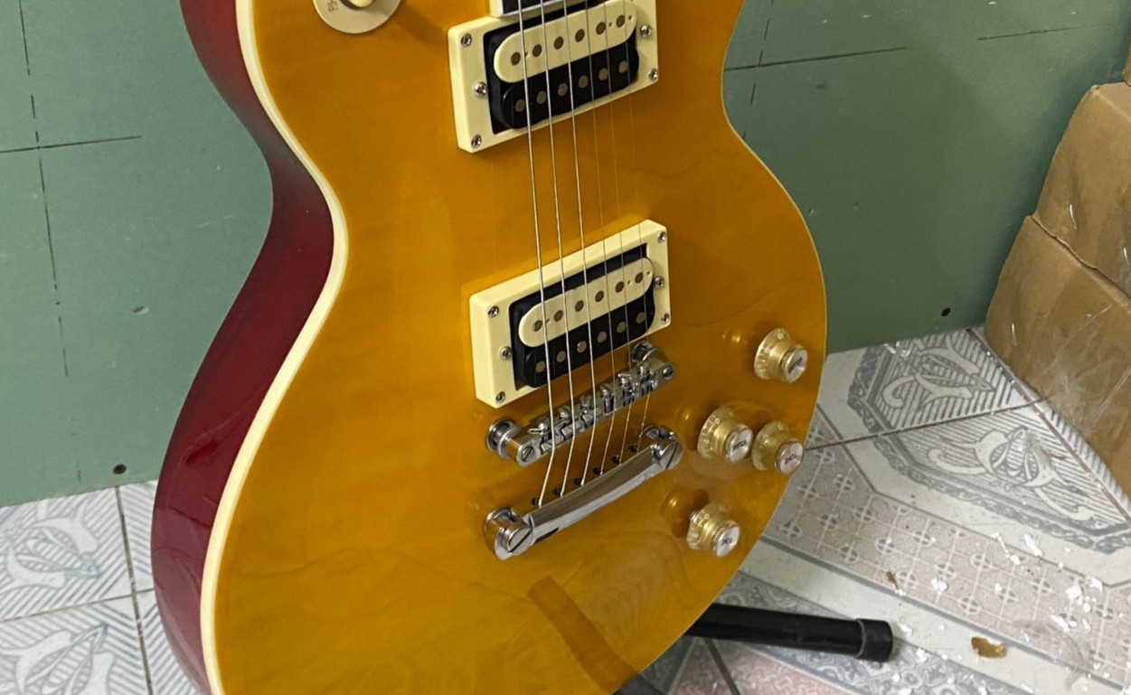 Solid Mahogany Electric Guitar Gloss Lemon Burst Flame Maple Top Zebra pickup