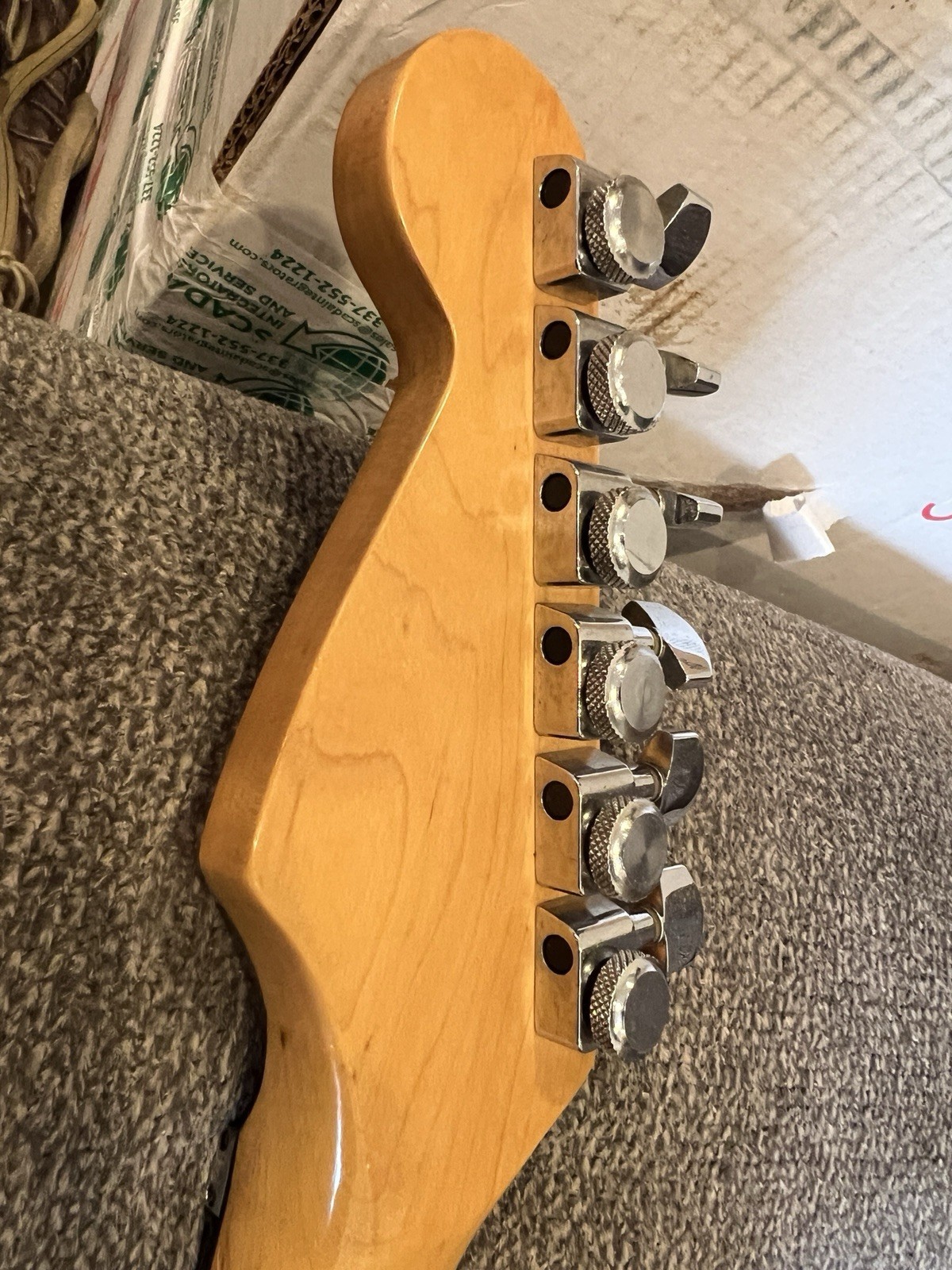1990 Fender Strat Ultra transparent black over a figured flamed maple top