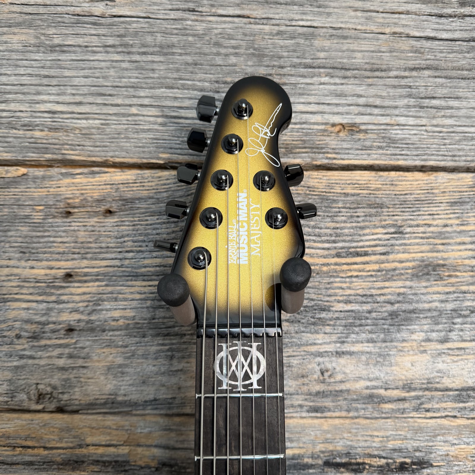 Ernie Ball Music Man Majesty 7 7-String Electric Guitar – Gold Eclipse