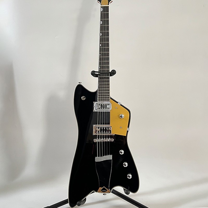 Shiny black alien-shaped electric guitar, gold pickguard, HH, solid wood, free s