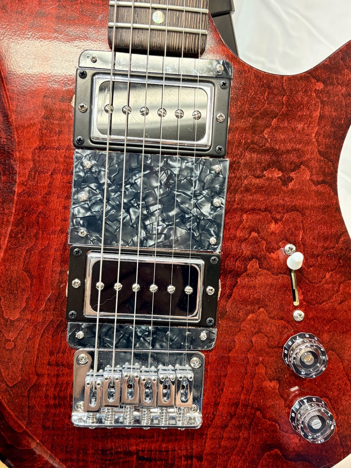 New red electric guitar with hard case, luthier made
