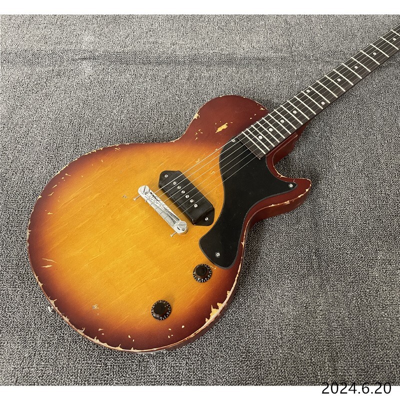 Electric guitar thin brown burst and see wood grain brown back black cover wrap
