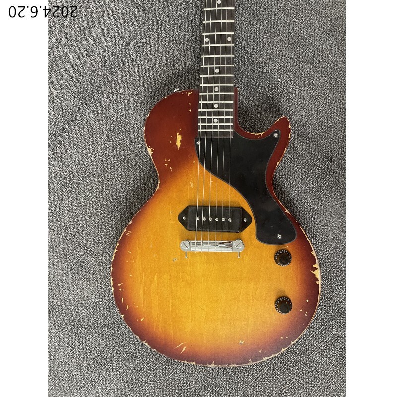 Electric guitar thin brown burst and see wood grain brown back black cover wrap