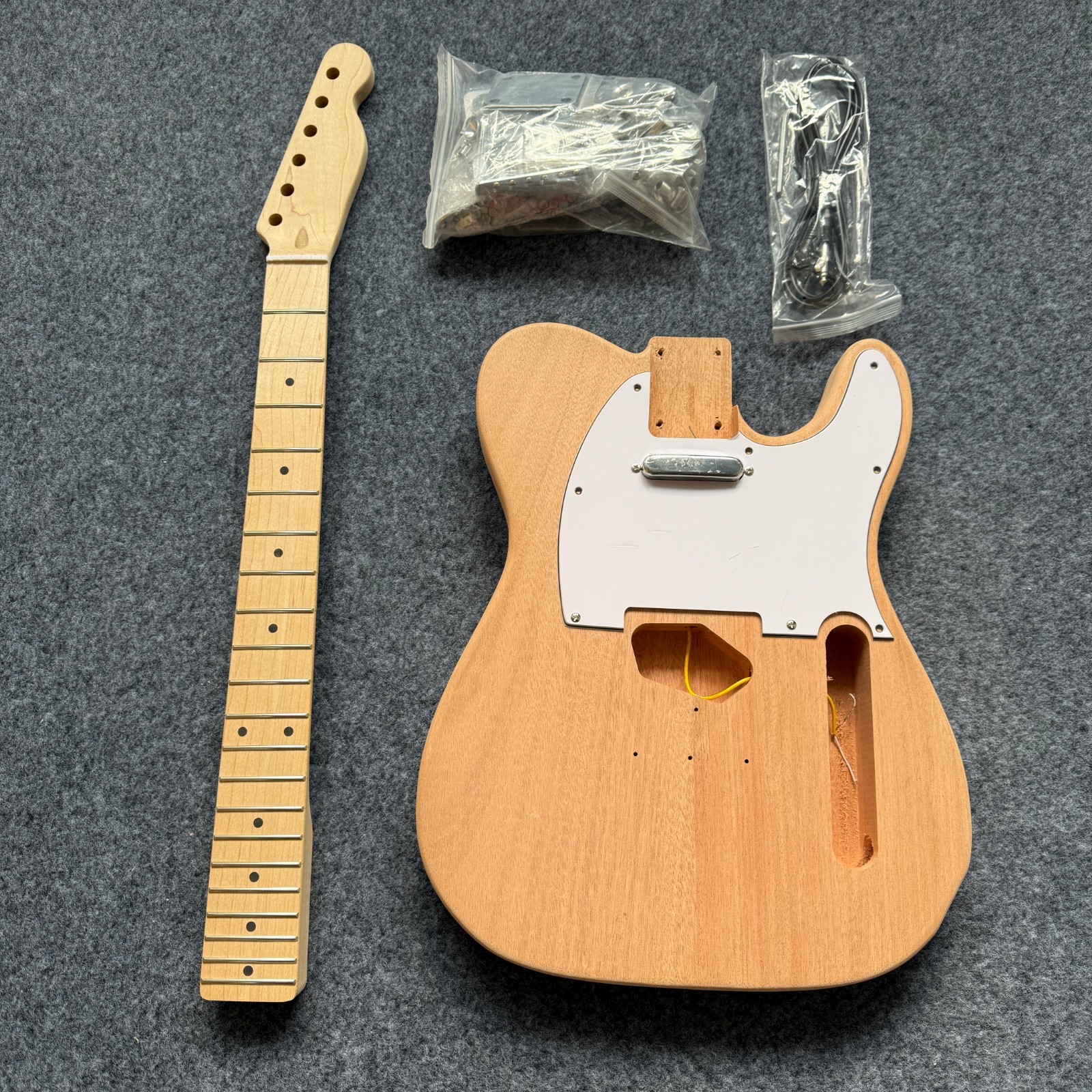 DIY electric guitar in natural wood color