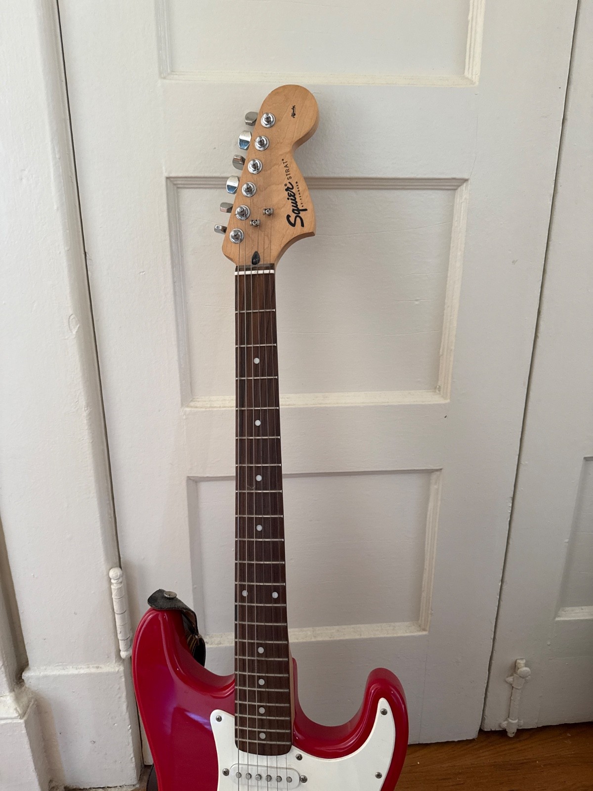 Squire Strat guitar, Red, hardly used, in good condition