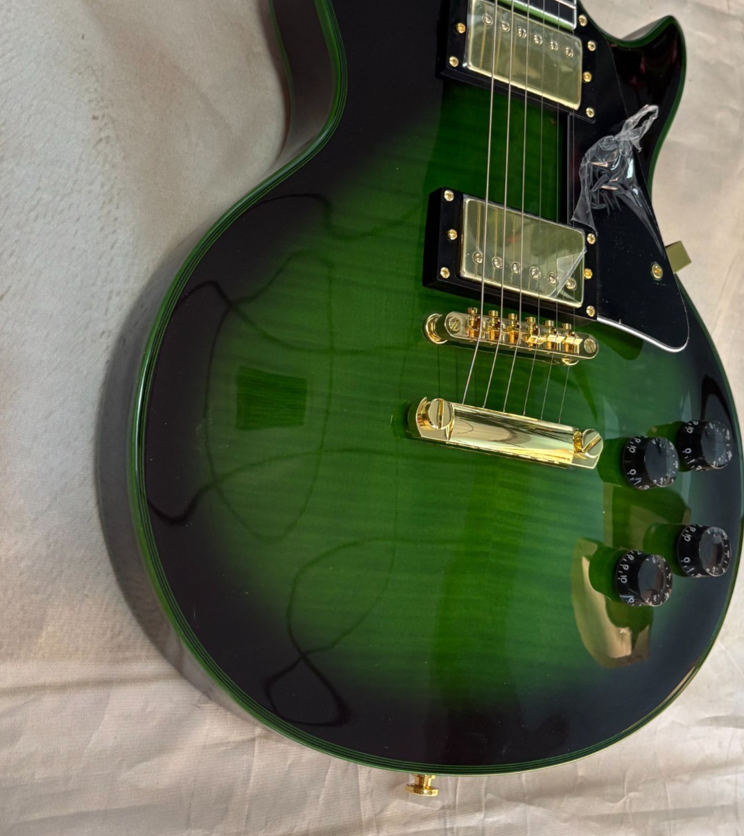 Metallic Green LP Style Electric Guitar Rosewood Fretboard Gold Hardware