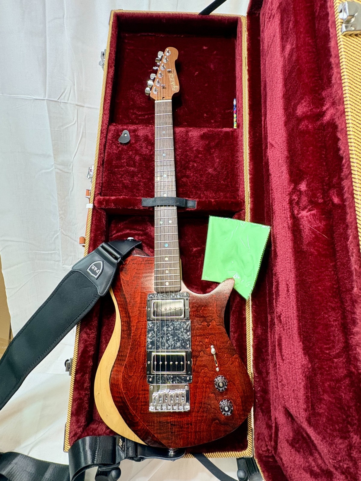 New red electric guitar with hard case, luthier made