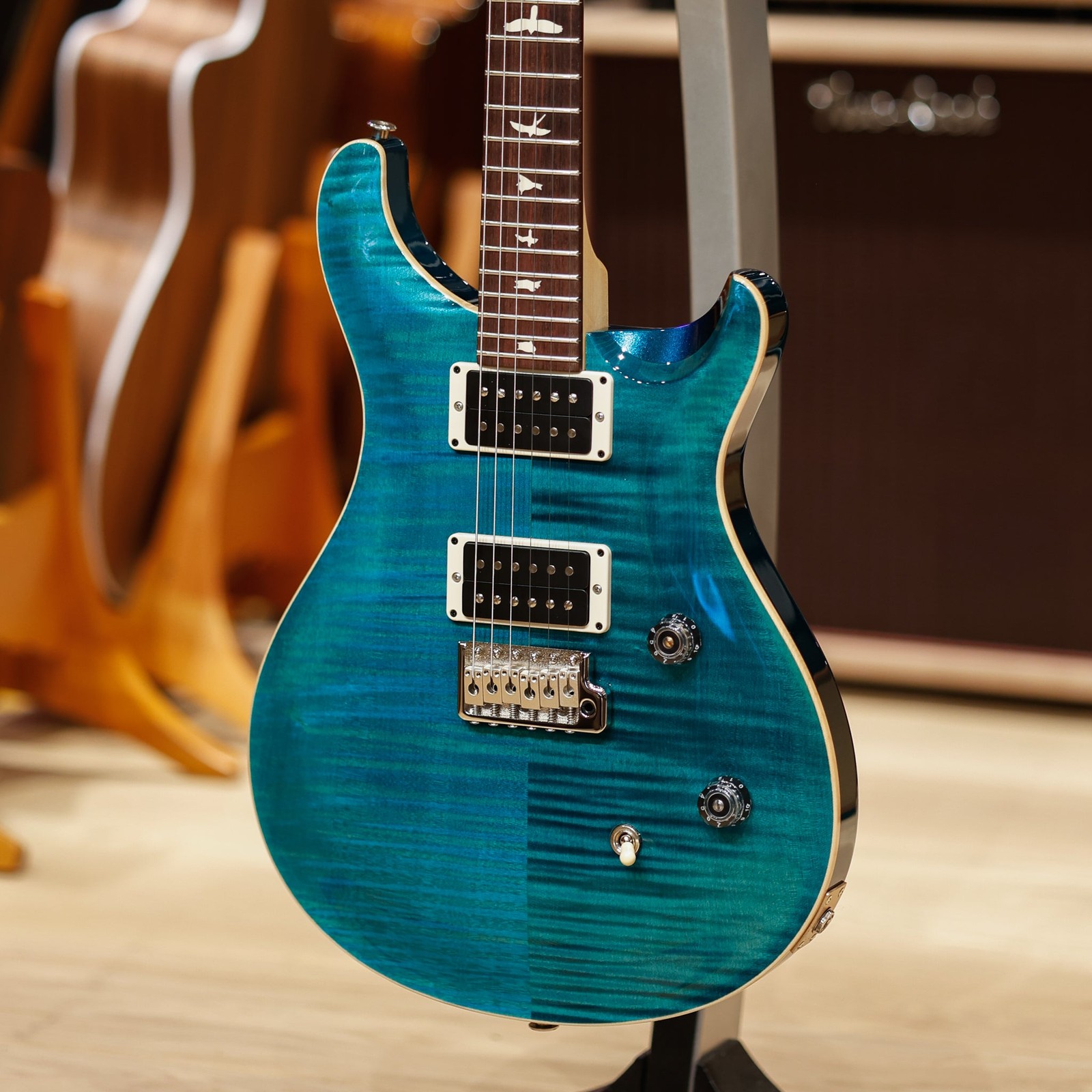 PRS CE 24 – “Sprayer’s Choice” Turquoise w/Sparkle Back