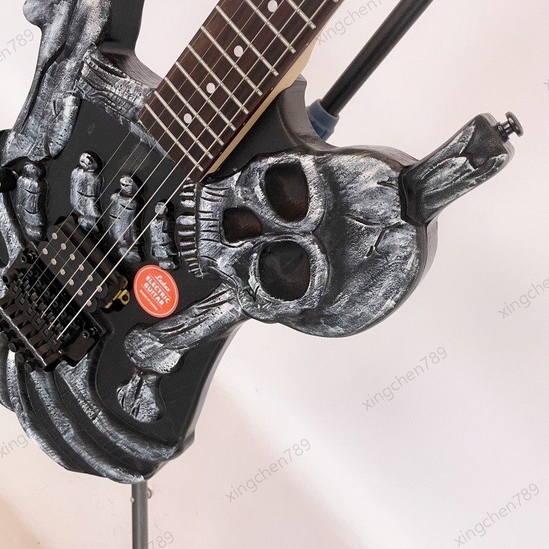 Left Hand Skull Solid Electric Guitar Rounded Fret Edge Maple Neck Hard Rock