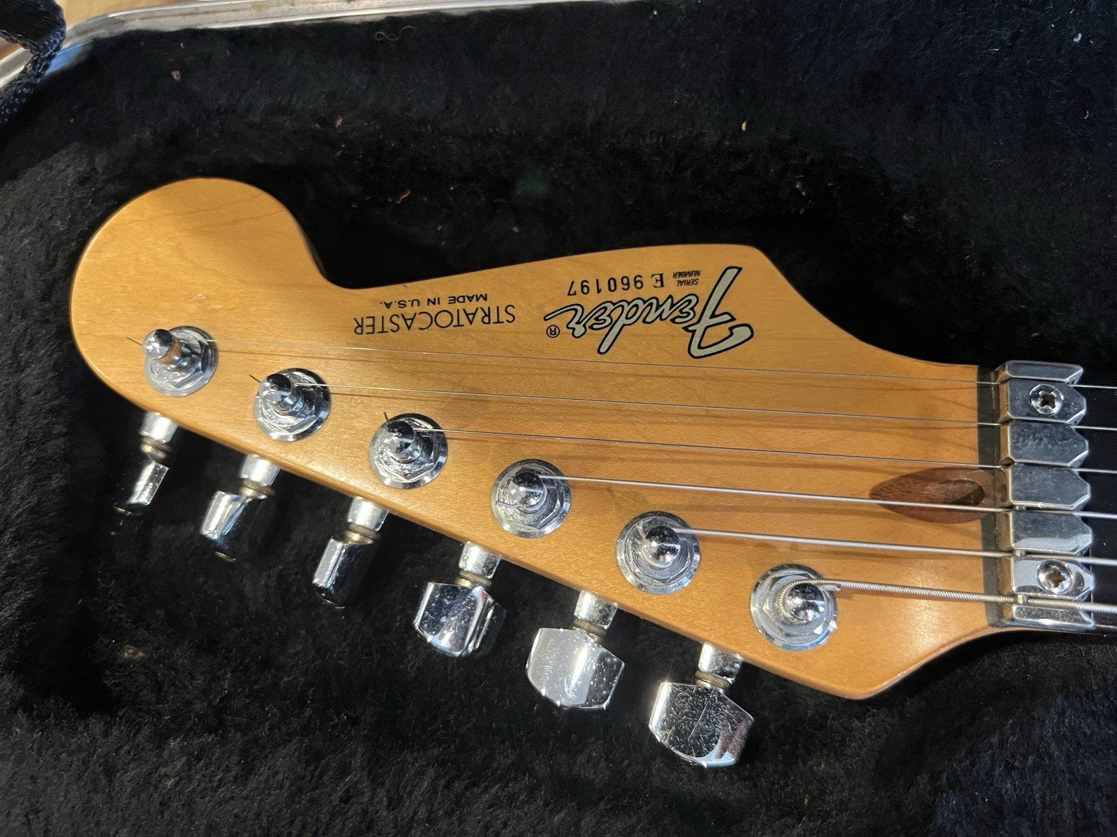 1990 Fender Strat Ultra transparent black over a figured flamed maple top