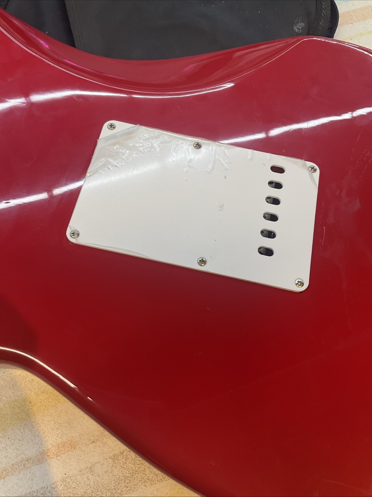 FENDER SQUIER STRAT RED WITH CUSTOM FLORAL 70S DESIGN AND GIG BAG ￼