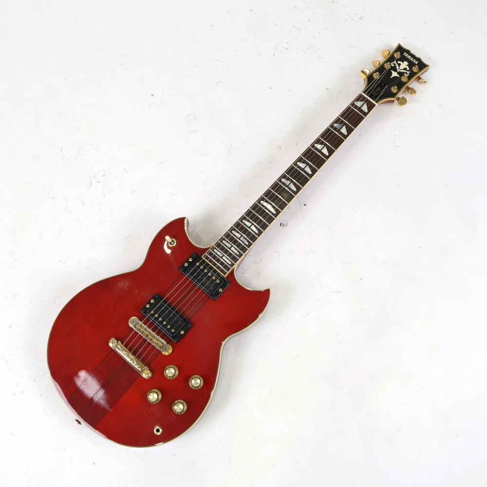 Used Yamaha SG1500 Persimmon Red, 1982 model.