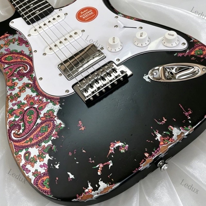 Solid Body Electric Guitar Stainless Fret Tremolo Bridge Black over Red Paisley