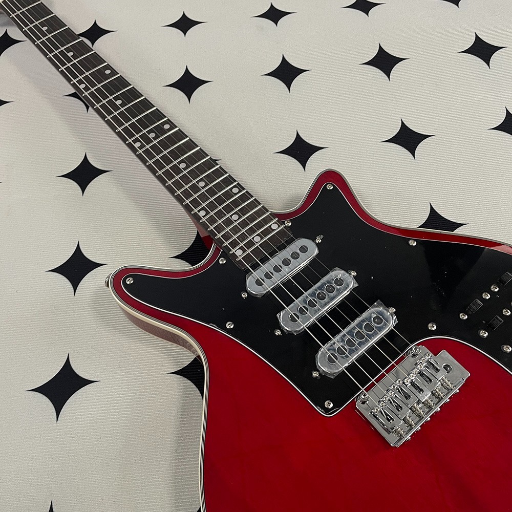 High-quality electric guitar; mahogany body and neck; stainless steel frets