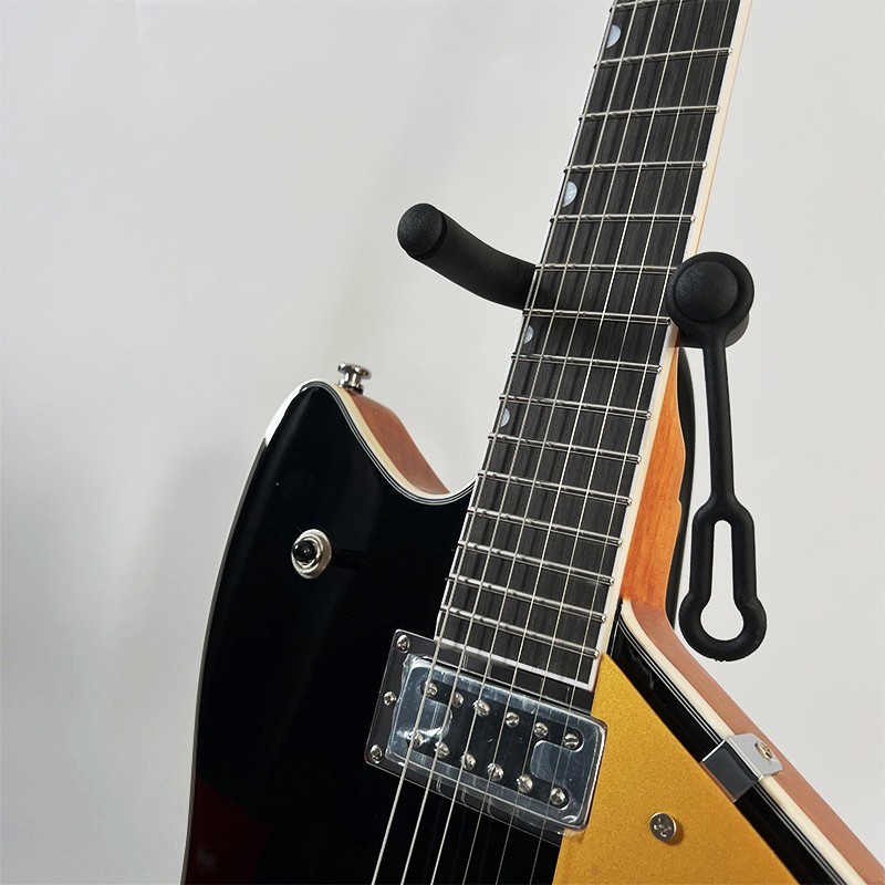 Shiny black alien-shaped electric guitar, gold pickguard, HH, solid wood, free s