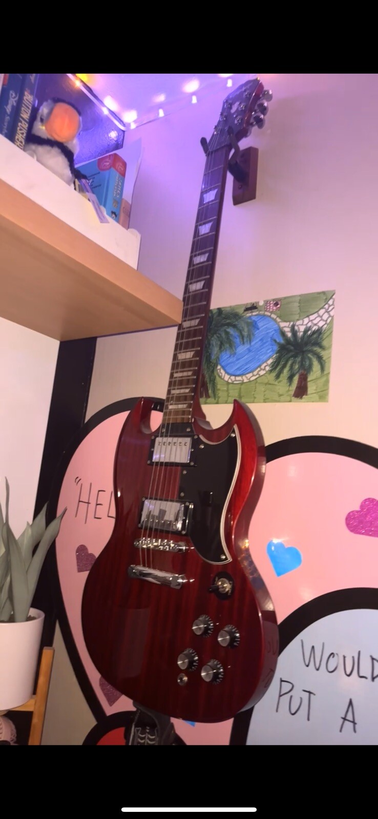 electric guitar with amp