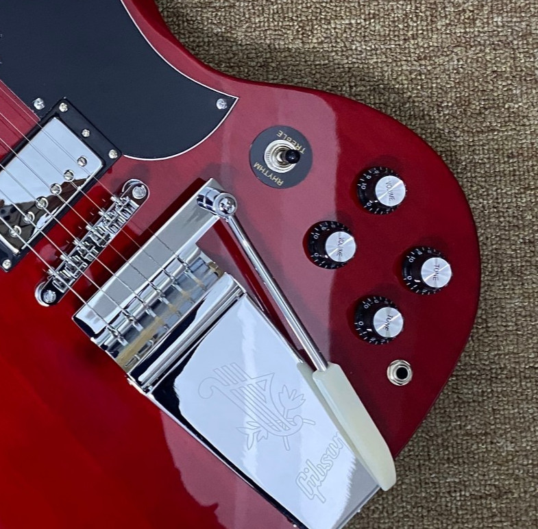 Brand-new, red 6-string electric guitar with chrome hardware, 22 frets in stock.
