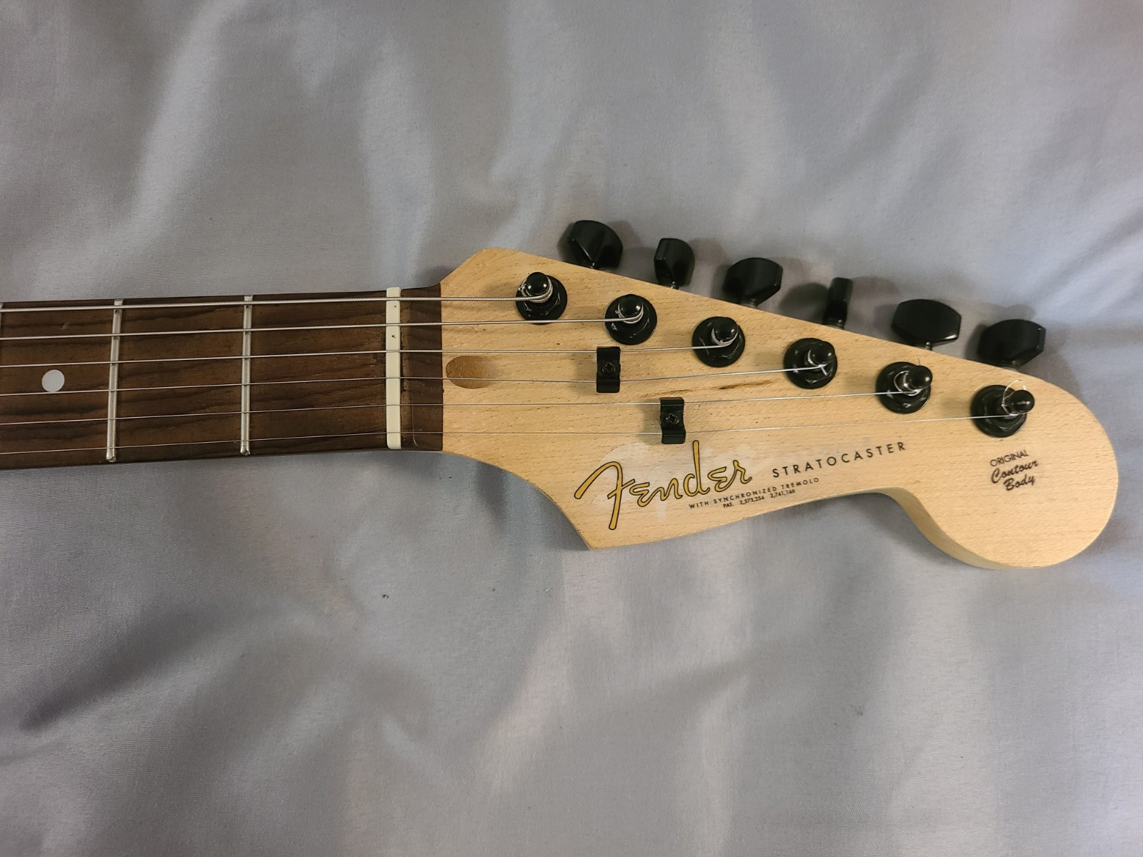 Stratocaster Partscaster – transparent blue with white binding