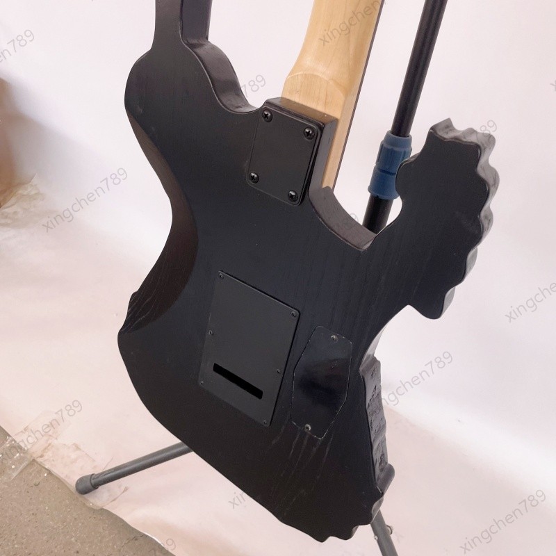 Left Hand Skull Solid Electric Guitar Rounded Fret Edge Maple Neck Hard Rock